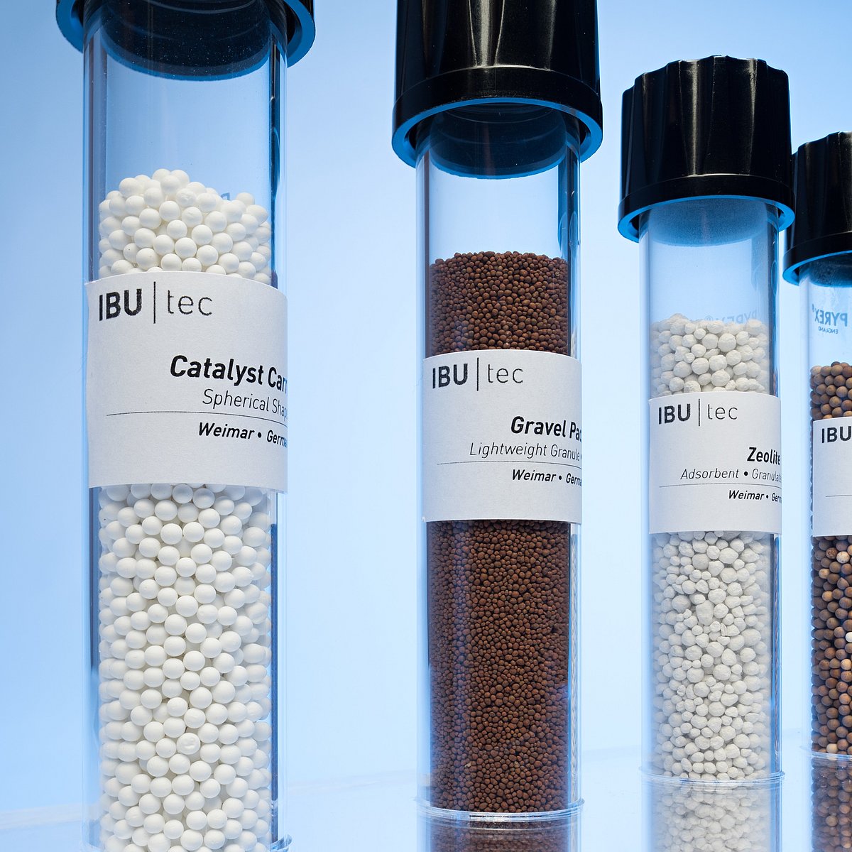 IBU-tec material samples in test tubes: carbon fibers, proppants and more