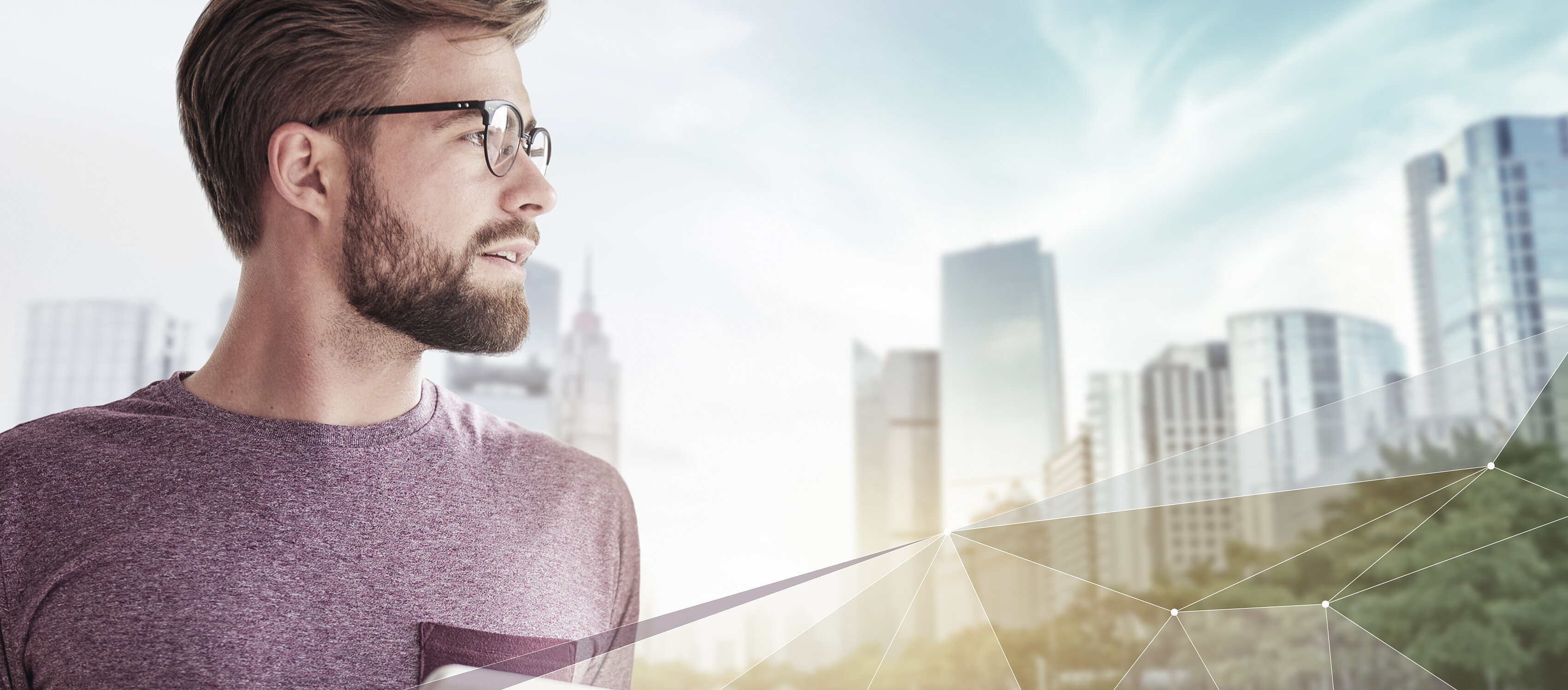 IBU-tec offers expertise in thermal process technology as well as capacity for tolling with chemical materials, portraied in a picture of a bearded man with glasses and tablet computer in front of a connected smart city
