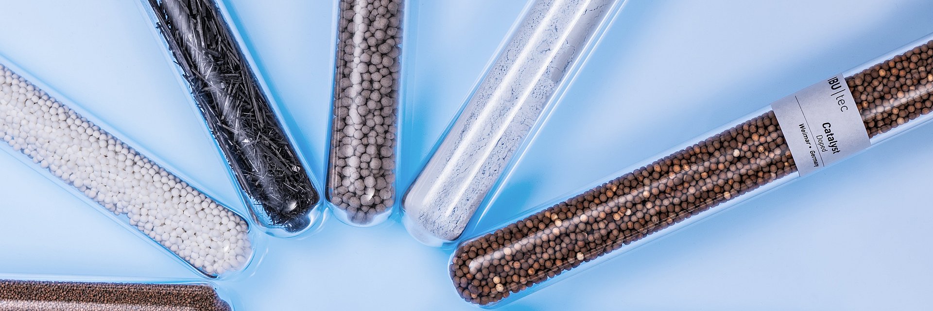 IBU-tec material samples in test tubes: carbon fibers, proppants and more